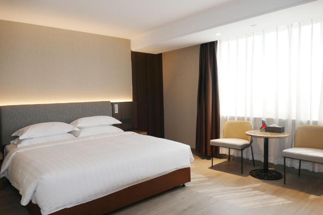 Jinan Yuquan Simpson Hotel Buitenkant foto