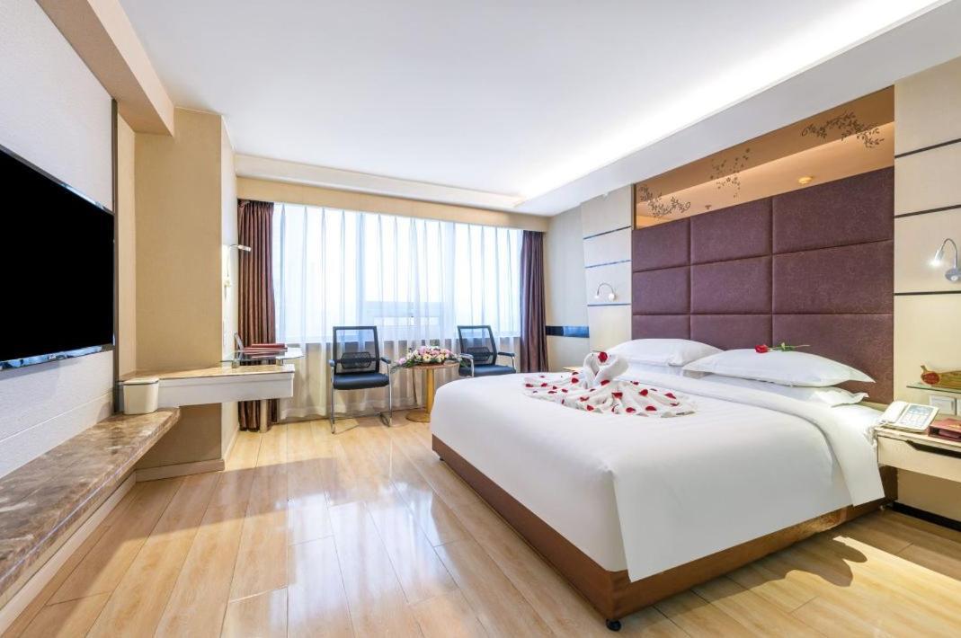 Jinan Yuquan Simpson Hotel Buitenkant foto